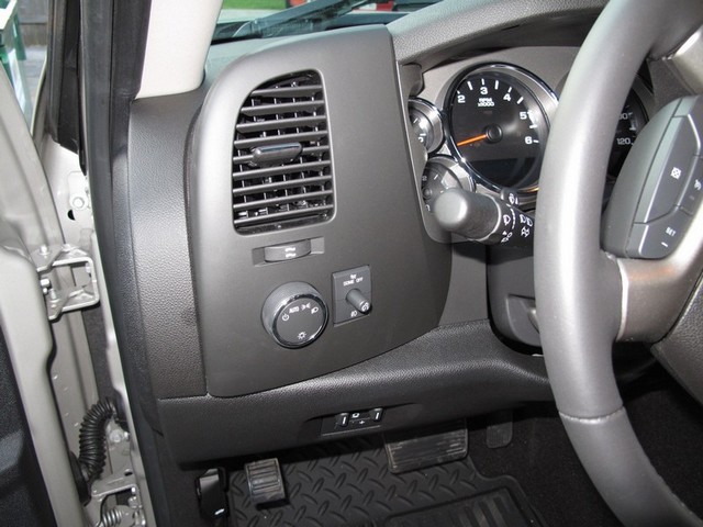 Original left trim panel without DIC buttons.